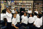 In celebration of National Library Week, Laura Bush visits the Martin Luther King Jr. Memorial Library and talks with fourth-graders from Maury Elementary School in Washington, D.C., Tuesday, April 12, 2005. During her visit to the library, Mrs. Bush read Oliver Butterworth's "The Enormous Egg" and introduced her Scottish Terrier Miss. Beazley to the students. White House photo by Krisanne Johnson