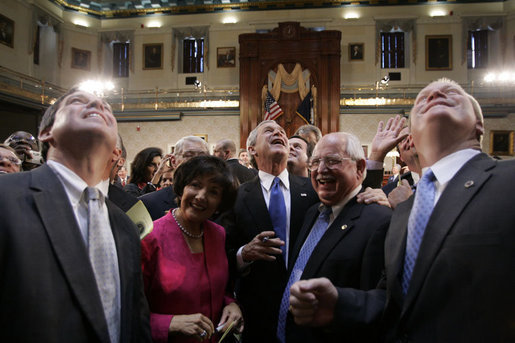 President George W. Bush wades into a crowd of legislators at the State House in Columbia, S.C., Monday, April 18, 2005. White House photo by Paul Morse