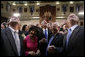 President George W. Bush wades into a crowd of legislators at the State House in Columbia, S.C., Monday, April 18, 2005. White House photo by Paul Morse