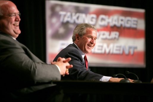 President George W. Bush shares a light moment with Jim Yarbrough, left, County Judge of Galveston County, during a roundtable discussion on Strengthening Social Security at the University of Texas Medical Branch in Galveston, Texas, Tuesday, April 26, 2005. White House photo by Eric Draper