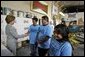 Laura Bush meets members of the Homeboy Industries program in Los Angeles during her tour of the facility April 27, 2005. White House photo by Krisanne Johnson