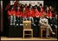 Laura Bush talks with middle school students on stage prior to delivering remarks at Sun Valley Middle School in Sun Valley, Calif., April 27, 2005. White House photo by Krisanne Johnson