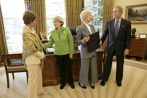 President George W. Bush and Laura Bush meet with Barbara de Marneff and Stephanie Copeland of Edith Wharton Restoration in Massachusetts, in the Oval Office Monday, May 2, 2005. The two women are two of the recipients of the 2005 Preserve America Presidential Award. White House photo by Eric Draper