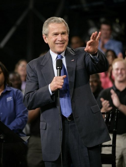 President George W. Bush waves to the audience during his introduction Tuesday, May 3, 2005, during a Conversation on Strengthening Social Security at the Nissan North America Manufacturing Plant in Canton, Miss. White House photo by Eric Draper