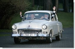 Russian President Vladimir Putin and President George W. Bush take a spin in President Putin's car during a visit Sunday night, May 8, 2005.  White House photo by Eric Draper