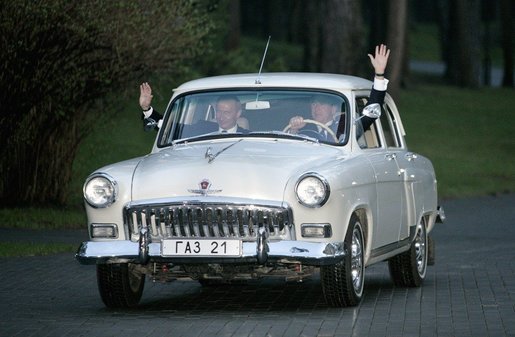 Russian President Vladimir Putin and President George W. Bush take a spin in President Putin's car during a visit Sunday night, May 8, 2005. White House photo by Eric Draper