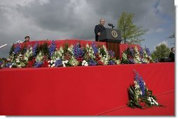 President George W. Bush addresses attendees Sunday, May 8, 2005, at Netherlands American Cemetery in Margraten, during a celebration in remembrance of those who served in World War II.  White House photo by Eric Draper