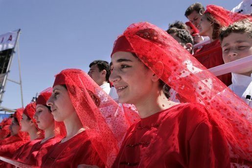 Georgian children in traditional dress join thousands of people gathered in Freedom Square to hear President Bush speak the President's in Tbilisi, Georgia, Tuesday, May 10, 2005. "As you build freedom in this country, you must know that the seeds of liberty you are planting in Georgian soil are flowering across the globe," said President Bush in his remarks. " I have come here to thank you for your courage." White House photo by Paul Morse