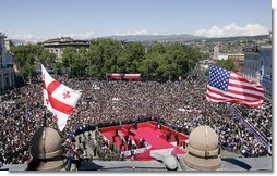 Thousands gather in Freedom Square to hear President George W. Bush speak in Tbilisi, Georgia, Tuesday, May 10, 2005. "When Georgians gathered here 16 years ago, this square had a different name. Under Lenin's steely gaze, thousands of Georgians prayed and sang, and demanded their independence, said President Bush. "The Soviet army crushed that day of protest, but they could not crush the spirit of the Georgian people."  White House photo by Paul Morse