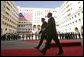 President George W. Bush walks with President Mikhail Saakashvili during an arrival ceremony in the courtyard of the Parliament Building in Tbilisi, Georgia, Tuesday, May 10, 2005. White House photo by Paul Morse