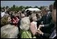 President George W. Bush meets some of the audience members at West Point, Va., Monday, May 16, 2005.White House photo by Eric Draper