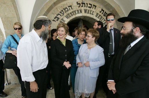 Laura Bush tours the Western Wall in Jerusalem with Rabbi Shmuel Rabinowitz; Gila Katsav, wife of Israeli President Moshe Katsav, center; and Mordechai Suli Eliav, manager of The Western Wall Heritage Foundation, May 22, 2005. White House photo by Krisanne Johnson