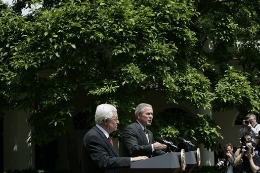 President George W. Bush and President Mahmoud Abbas of the Palestinian Authority, respond to questions during a joint press availability Thursday, May 26, 2005, in the Rose Garden of the White House. White House photo by Eric Draper