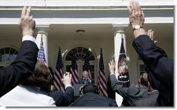 President George W. Bush points to raised hands as he fields a question from the media during a press availability Tuesday, May 31, 2005, in the Rose Garden of the White House. White House photo by Eric Draper