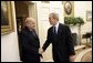 President George W. Bush welcomes Dr. Jose Miguel Insulza, Secretary General of the Organization of American States, to the Oval Office of the White House Tuesday, May 31, 2005. The former Chilean interior minister assumed the OAS office May 26, 2005. White House photo by Eric Draper