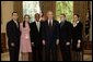 President George W. Bush stands with the 2004 Boys & Girls Club of America's Youth of the Year finalists in the Oval Office Wednesday, June 1, 2005. From left are: Ramon Moran of Tucson, Ariz.; Noelia Bare of Lawrence, Mass.; Stephen Miller of Mobile, Ala.; President Bush; Thomas "T.J." Rancour of Bay County, Mich., and Danielle Snead of San Antonio. White House photo by Eric Draper