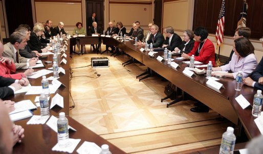 President George W. Bush conducts a roundtable meeting with members of the Radio-Television News Directors Association Wednesday, June 1, 2005, in the Eisenhower Executive Office Building. White House photo by Paul Morse