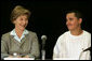 Laura Bush talks with Freddy Martinez, 17, during a roundtable discussion on stopping violent crime in Chicago on June 2, 2005. CeaseFire Chicago is a public health initiative that works with community partners to reduce violence. White House photo by Krisanne Johnson