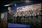 President George W. Bush receives a standing ovation from members of the Ohio State Highway Patrol before delivering remarks on the Patriot Act at in Columbus, Ohio, Thursday, June 9, 2005. White House photo by Eric Draper