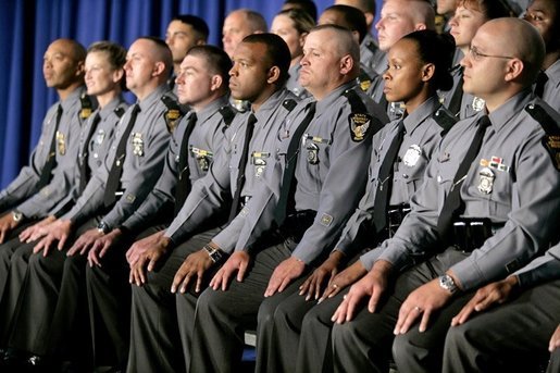 Members of the Ohio State Highway Patrol listen as President George W. Bush speaks about the Patriot Act at the Ohio State Highway Patrol Academy in Columbus, Ohio, Thursday, June 9, 2005. "Every day the men and women of law enforcement use the Patriot Act to keep America safe. It's the nature of your job that many of your most important achievements must remain secret," said the President in his remarks. "Americans will always be grateful for the risks you take, and for the determination you bring to this high calling." White House photo by Eric Draper