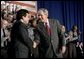 President George W. Bush thanks Attorney General Alberto Gonzales after speaking about the Patriot Act at the Ohio State Highway Patrol Academy in Columbus, Ohio, Thursday, June 9, 2005. White House photo by Eric Draper