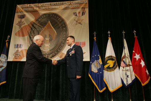 Vice President Dick Cheney awards U.S. Air Force Major Matthew R. Glover the Distinguished Flying Cross during the Heroism Awards Ceremony at the Davis Conference Center, MacDill Air Force Base, in Tampa, Fla., Friday, June 10, 2005. White House photo by David Bohrer