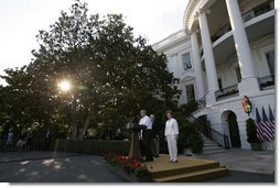 President George W. Bush and Mrs. Bush address their guests at the Congressional Picnic on the South Lawn Wednesday, June 15, 2005.  White House photo by Paul Morse