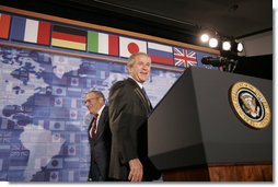 President George W. Bush stands at the podium after being introduced at the Freer Gallery in Washington D.C., Thursday, June 30, 2005, by Walter Stern, Chairman of the Board of Trustees, the Hudson Institute. The President spoke about his participation in the upcoming G8 Summit in Scotland, highlighting new initiatives to improve the quality of life of sub-Saharan Africans. White House photo by Paul Morse