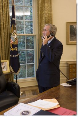 President George W. Bush speaks via phone to Associate Supreme Court Justice Sandra Day O'Connor Friday, July 1, 2005, shortly after she submitted her letter of resignation citing personal reasons. The letter sits on the desk. White House photo by Paul Morse