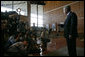 President George W. Bush addresses the press after visiting with wounded troops at Walter Reed Army Medical Center Friday, July 1, 2005. White House photo by Eric Draper