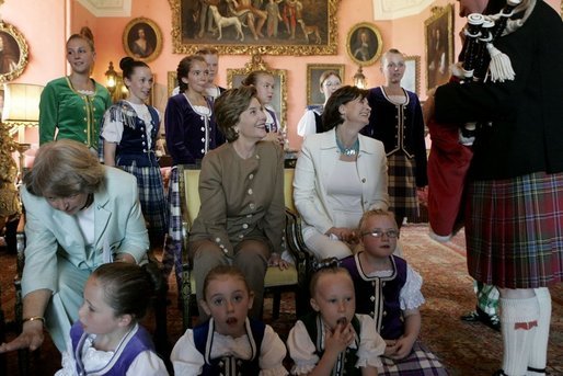 First Lady Laura Bush sits with Cherie Blair and Sheila Martin, left, during a cocktail reception and dinner Thursday, July 7, 2005 at the Gleneagles Hotel in Auchterarder, Scotland. White House photo by Krisanne Johnson