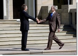 President George W. Bush is welcomed to Gleneagles Hotel in Auchterarder, Scotland, by the United Kingdom's Prime Minister Tony Blair Thursday, July 7, 2005, for the first G8 session. White House photo by Eric Draper