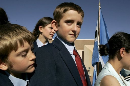 Schoolboys await the departure Monday, July 11, 2005 of Laura Bush from Gaborone International Airport in Gaborone, Botswana. White House photo by Krisanne Johnson