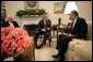 President George W. Bush and Vice President Dick Cheney meet with U.S. Ambassador to Iraq Zalmay Khalilzad in the Oval Office Monday, July 11, 2005. Ambassador Khalilzad was sworn in at the U.S. Embassy in Baghdad, Iraq, June 21, 2005. White House photo by Eric Draper