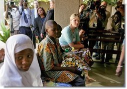 Jenna Bush listens to children with HIV/AIDS at PASADA in Dar es Salaam, Tanzania, Wednesday, July 13, 2005. “PASADA trains caregivers to provide home-based care for people living with AIDS. PASADA also provides support to orphans and other vulnerable children - boys and girls who have lost one or both of their parents to AIDS. These children need help with all the challenges that come with growing up - and with the responsibilities that an adult would usually handle,” said Mrs. Bush in her comments.  White House photo by Krisanne Johnson