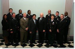 Vice President Dick Cheney and Attorney General Alberto Gonzales stands with recipients of the 2005 Public Safety Officer Medal of Valor Award in the Dwight D. Eisenhower Executive Office Building Thursday, July 14, 2005. The Medal of Valor is awarded to public safety officers cited by the Attorney General for extraordinary courage above and beyond the call of duty. White House photo by David Bohrer