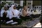 Jenna Bush sits with students at the Kiembesamaki Teacher Training School in Zanzibar, Tanzania, Wednesday, July 14, 2005. White House photo by Krisanne Johnson