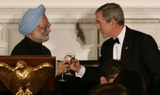 President George W. Bush and India's Prime Minister Dr. Manmohan Singh toast the evening in honor of Singh's visit, at the official dinner in the State Dining Room, Monday evening, July 18, 2005, at the White House. White House photo by Carolyn Drake