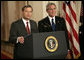 President George W. Bush looks on as his Supreme Court Justice Nominee John Roberts delivers remarks on the State Floor of the White House, Tuesday evening, July 19, 2005. White House photo by Eric Draper