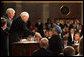 Vice President Dick Cheney shakes hands with Prime Minister Dr. Manmohan Singh of India upon the conclusion of his address to a Joint Meeting of Congress at the U.S. Capitol Tuesday, July 19, 2005. Also pictured at left is Speaker of the House Dennis Hastert. White House photo by David Bohrer