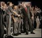 President George W. Bush meets Maryland Transportation Authority police officers, following his address to an audience Wednesday, July 20, 2005 at the Port of Baltimore in Baltimore, Md., where he encouraged renewal of Patriot Act provisions. White House photo by Eric Draper