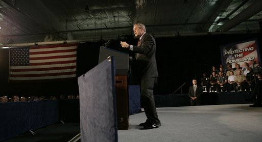 President George W. Bush gestures as he addresses an audience Wednesday, July 20, 2005 at the Port of Baltimore in Baltimore, Md., encouraging the renewal of provisions of the Patriot Act. White House photo by Eric Draper