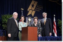 Vice President Dick Cheney and Commerce Secretary Carlos Gutierrez, far right, stand with representatives of The Bama Companies, Inc., which is one of four companies awarded the Malcolm Baldrige National Quality Award during a ceremony in Washington, D.C., Tuesday, July 20, 2005.  White House photo by Paul Morse