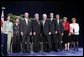 Vice President Dick Cheney stands with the 2004 Recipients of the Malcolm Baldrige National Quality Award during a ceremony in Washington, D.C., Tuesday, July 20, 2005. White House photo by Paul Morse