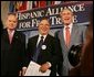 President George W. Bush meets with Chile's Jose Miguel Insulza, left, Secretary General, Organization of American States and Raul Yzaguirre, center, CEO of the National Council of La Raza, Thursday, July 21, 2005, following the President's address to the Hispanic Alliance for Free Trade in Washington. White House photo by Eric Draper