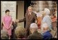 President George W. Bush appears with his mother Barbara Bush, and Medicare trainer Patty Patterson, Friday, July 22, 2005, at the Wesley Woods Center in Atlanta, to talk about new options in Medicare available to senior citizens. White House photo by Paul Morse