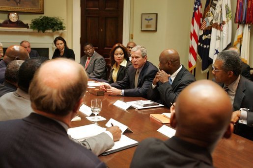 President George W. Bush meets with African American leaders Monday, July 25, 2005, in the Roosevelt Room of the White House to discuss key issues and to announce the corporate and philanthropic summit to be held in March 2006. White House photo by Krisanne Johnson