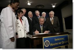 President George W. Bush signs the Patient Safety and Quality Improvement Act of 2005, at a signing ceremony Friday, July 29, 2005 at the Eisenhower Executive Office Building in Washington, D.C. White House photo by Eric Draper