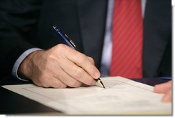 President George W. Bush signs H.R. 6, The Energy Policy Act of 2005 at Sandia National Laboratory in Albuquerque, New Mexico, Monday, Aug. 8, 2005. White House photo by Eric Draper