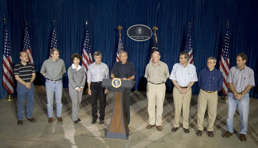 President George W. Bush stands with his economic advisors as he addresses a news conference, Tuesday, Aug. 9, 2005 at the Bush Ranch in Crawford, Texas, following a meeting to discuss the strength of the U.S. economy. From left to right are Dr. Ben Bernanke, chairman of the Council of Economic Advisers; U.S. Trade Representative Rob Portman; U.S. Secretary of Labor Elaine Chao; U.S. Secretary of Agriculture Mike Johanns; U.S. Treasury Secretary John Snow; U.S. Commerce Secretary Carlos Gutierrez; OMB Director Josh Bolten and assistant to the President on economic policy, Allan B. Hubbard. White House photo by Paul Morse